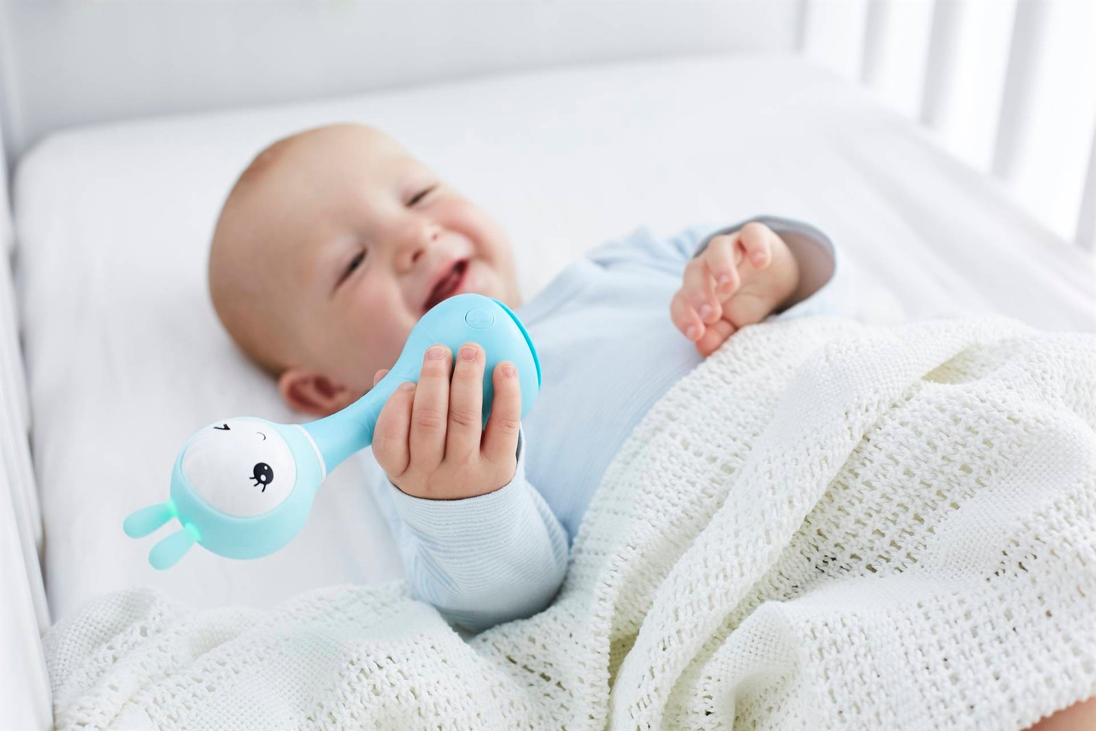 Baby playing with an Alilo toy