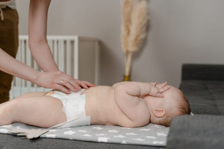 Parent and baby in a calm home nursery